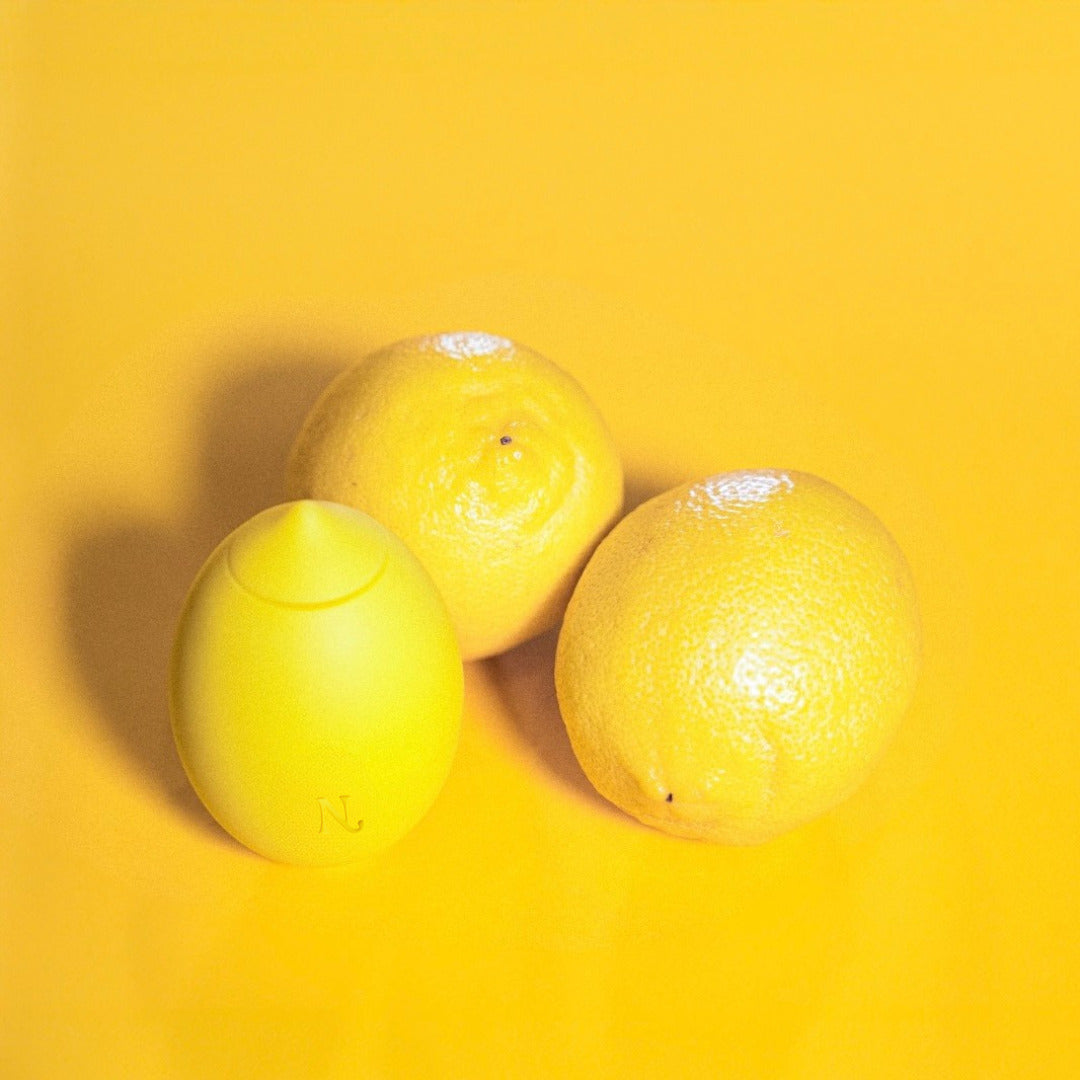 Lemon clitoral vibrator — in hand