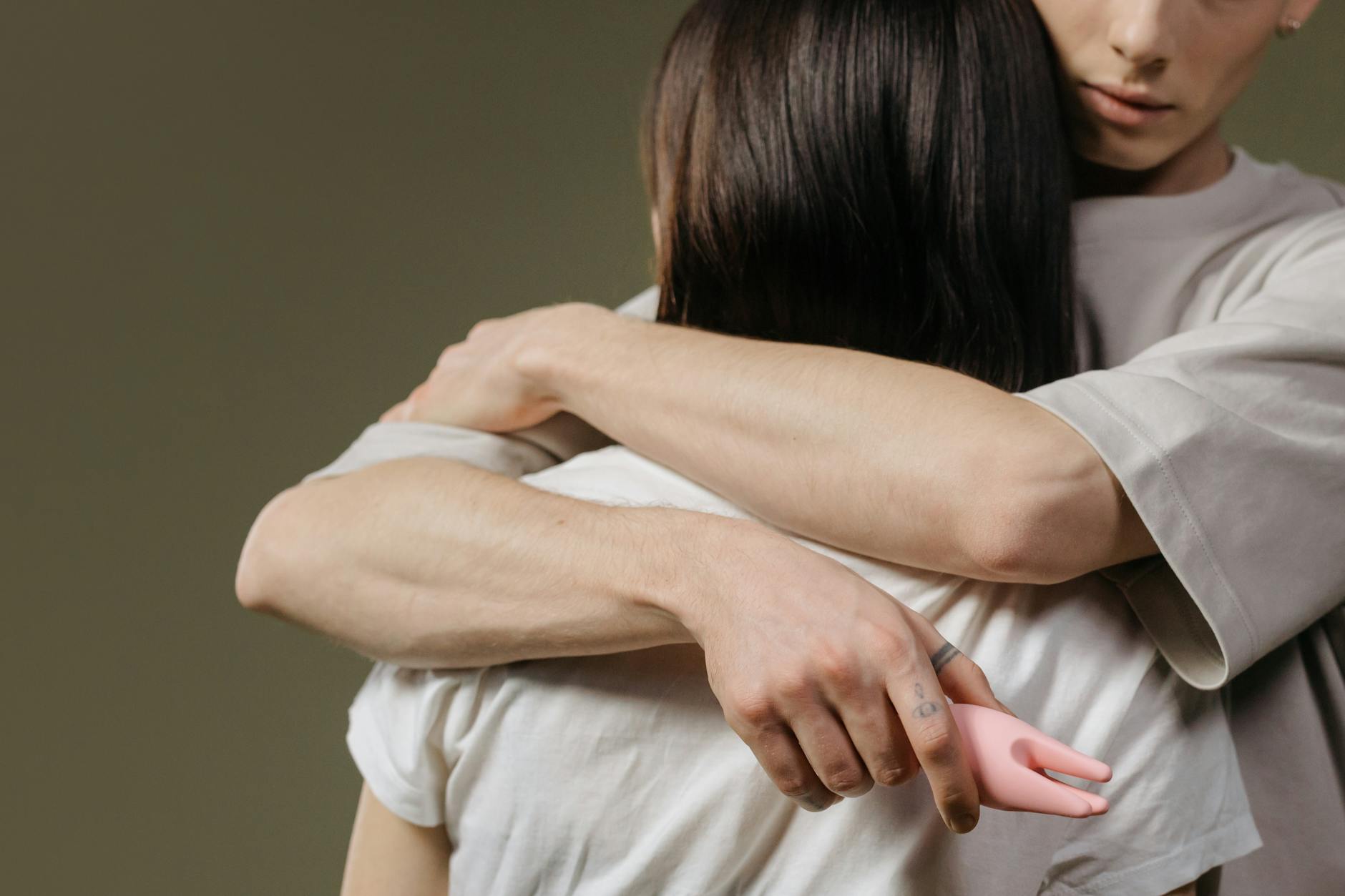 A close-up of a couple embracing, highlighting intimacy and connection.